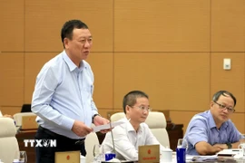 Tổng Thanh tra Chính phủ Đoàn Hồng Phong thuyết trình về nội dung cơ bản của dự thảo. (Ảnh: Tuấn Anh/TTXVN)