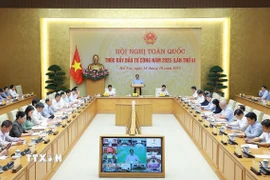 Thủ tướng Phạm Minh Chính chủ trì Hội nghị toàn quốc lần thứ 4 về thúc đẩy đầu tư công năm 2025. (Ảnh: Dương Giang/TTXVN)