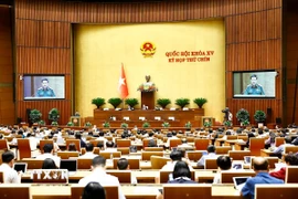 Bộ trưởng Bộ Quốc phòng Phan Văn Giang trình bày Tờ trình dự án các luật liên quan đến quốc phòng-an ninh. (Ảnh: Doãn Tấn/TTXVN)
