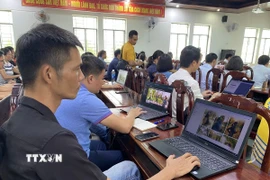 Lớp tập huấn AI cho giảng viên trường Đại học Thể dục Thể thao Đà Nẵng. (Ảnh: Xuân Quý/TTXVN)