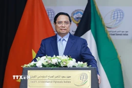 Thủ tướng Phạm Minh Chính phát biểu về chính sách của Việt Nam tại Học viện Ngoại giao Kuwait. (Ảnh: Dương Giang/TTXVN)