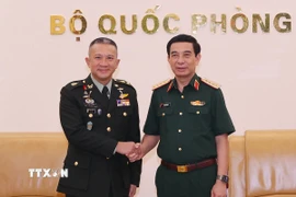 Đại tướng, Bộ trưởng Quốc phòng Phan Văn Giang tiếp Đại tướng Songwit Noonpackdee, Tư lệnh Lực lượng Quốc phòng Thái Lan. (Ảnh: Trọng Đức/TTXVN)