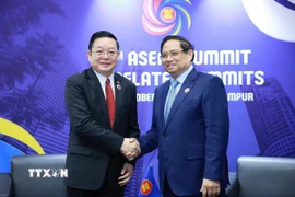 Thủ tướng Phạm Minh Chính gặp Tổng Thư ký ASEAN Kao Kim Hourn. (Ảnh: Dương Giang/TTXVN)