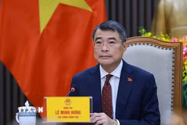 Thủ tướng Chính phủ Lê Minh Hưng điện đàm với Thủ tướng Trung Quốc Lý Cường. (Ảnh: Dương Giang/TTXVN)