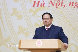 Thủ tướng Phạm Minh Chính chủ trì Hội nghị trực tuyến toàn quốc thúc đẩy đầu tư công năm 2025 và năm 2026. (Ảnh: Dương Giang/TTXVN)