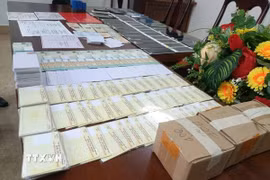 Tang vật thu giữ tại hiện trường. (Ảnh: TTXVN phát)