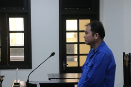 Bị cáo Liên Việt Triều tại phiên tòa. (Ảnh: Tuấn Kiệt/TTXVN)