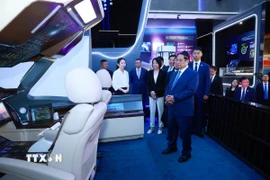 Thủ tướng Phạm Minh Chính thăm Triển lãm thành tựu phát triển của Khu Phố Đông. (Ảnh: Dương Giang/TTXVN)