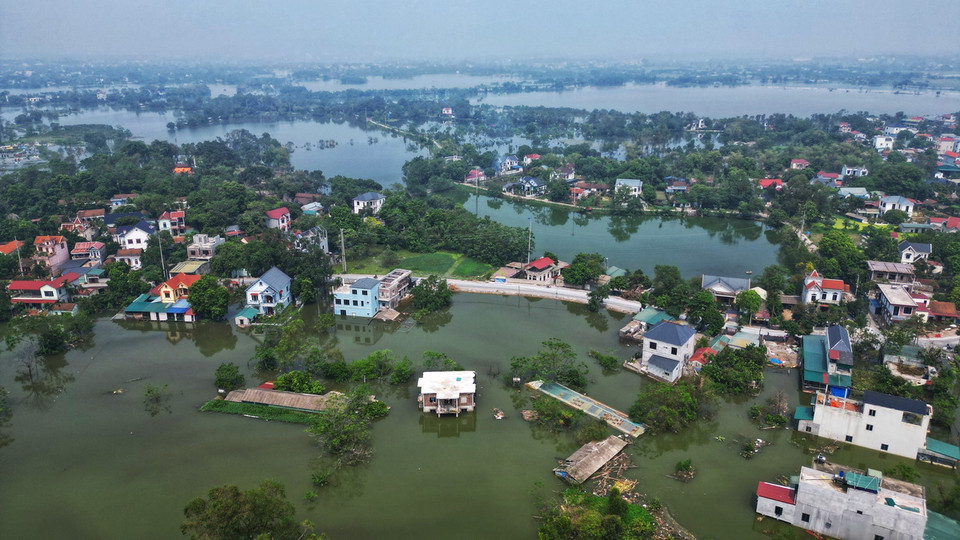 Có 875 hộ với hơn 4.000 nhân khẩu bị ngập (ảnh chụp sáng 15/9). (Ảnh: Tuấn Anh/TTXVN)