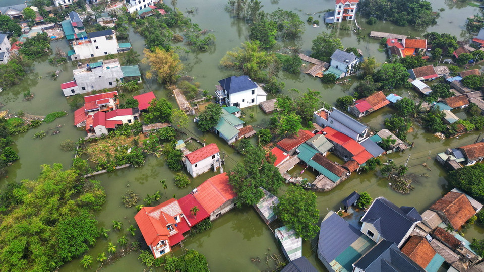 Các con đường liên thôn bị ngập toàn bộ (ảnh chụp sáng 15/9). (Ảnh: Tuấn Anh/TTXVN)
