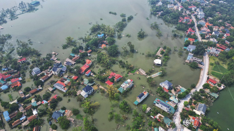 Tính đến ngày 15/9, toàn xã Nam Phương Tiến có 875 hộ bị ngập (ảnh chụp sáng 15/9). (Ảnh: Tuấn Anh/TTXVN)