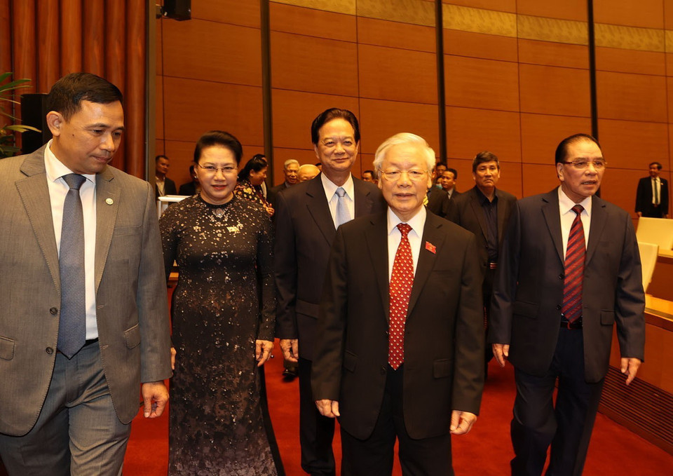 Tổng Bí thư, Chủ tịch nước Nguyễn Phú Trọng, Chủ tịch Quốc hội Nguyễn Thị Kim Ngân với các đồng chí nguyên lãnh đạo Đảng, Nhà nước. (Ảnh: Trí Dũng/TTXVN)