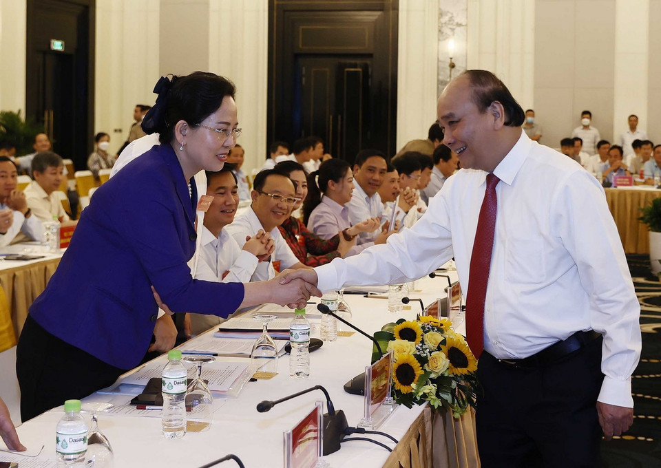 Chủ tịch nước Nguyễn Xuân Phúc và các đại biểu tại hội nghị. (Ảnh: Thống Nhất/TTXVN) 