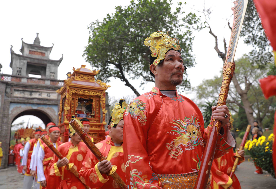 Nghi thức rước kiệu trong ngày khai hội Cổ Loa Xuân Quý Mão 2023. (Ảnh: Vũ Sinh/TTXVN)