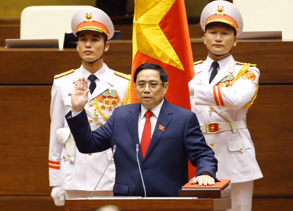  Thủ tướng Chính phủ Phạm Minh Chính thực hiện nghi lễ tuyên thệ. (Ảnh: Doãn Tấn/TTXVN)