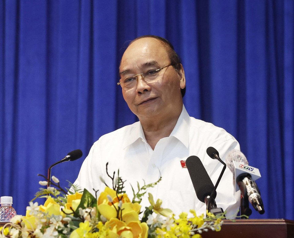 Chủ tịch nước Nguyễn Xuân Phúc phát biểu tại buổi tiếp xúc cử tri quận Gò Vấp. 