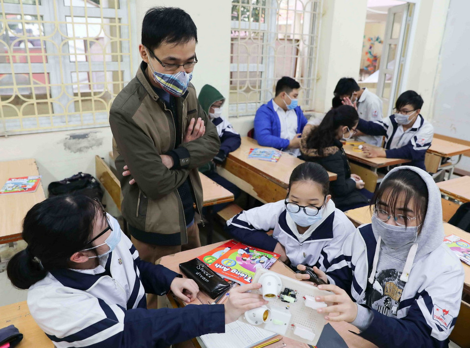  Tất cả học sinh của trường THCS Thăng Long, quận Ba Đình (Hà Nội) đều chấp hành nghiêm chỉnh việc đeo khẩu trang phòng chống dịch. (Ảnh: Thanh Tùng/TTXVN)