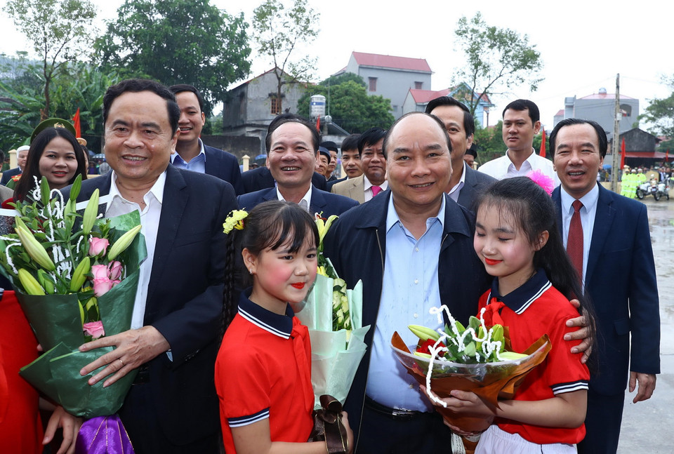 Thủ tướng Nguyễn Xuân Phúc dự Ngày hội đại đoàn kết toàn dân tộc. (Ảnh: Thống Nhất/TTXVN)