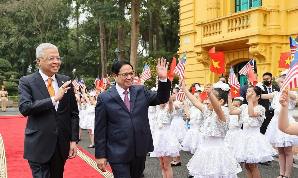 Thủ tướng Phạm Minh Chính chủ trì Lễ đón Thủ tướng Malaysia Dato Sri Ismail Sabri bin Yaakob thăm chính thức Việt Nam, ngày 21/3/2022. (Ảnh: Dương Giang/TTXVN)