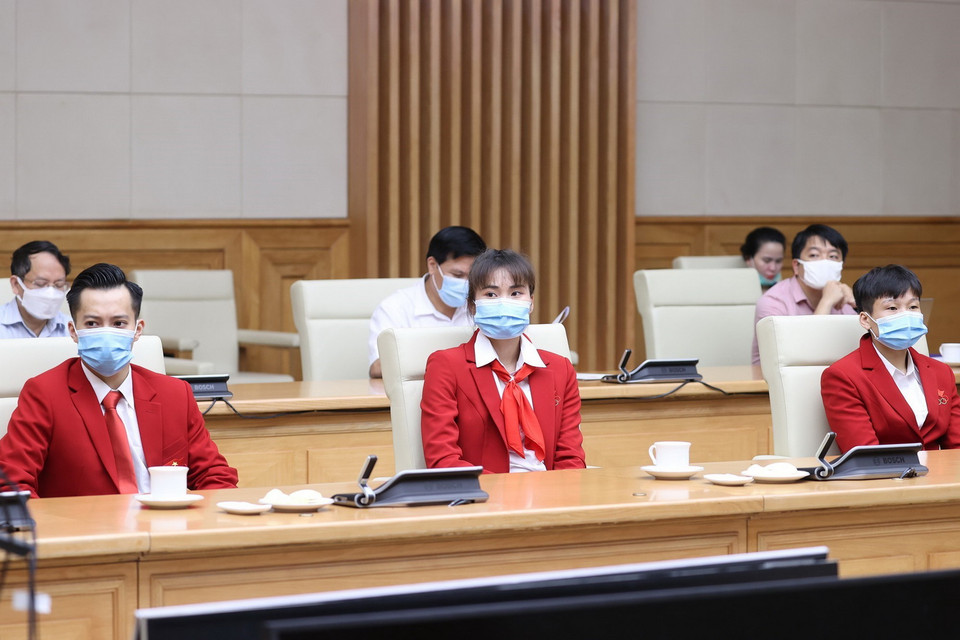 Các vận động viên Việt Nam tham dự Olympic Tokyo 2020 tại buổi gặp. (Ảnh: Dương Giang/TTXVN)