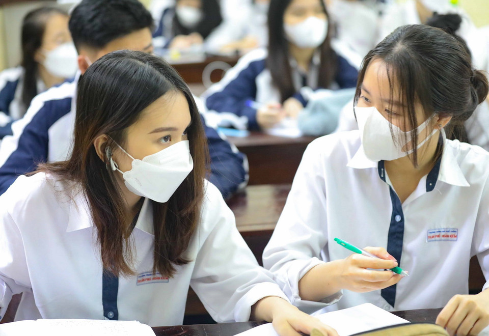 Học sinh hào hứng đến trường. (Ảnh: Thanh Tùng/TTXVN) 