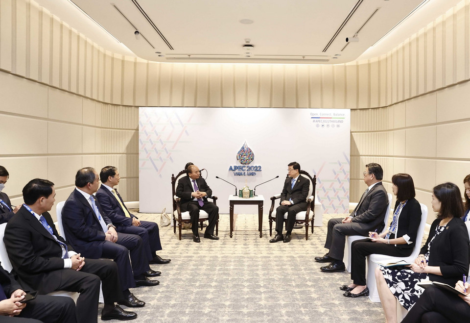 Quang cảnh buổi gặp của Chủ tịch nước Nguyễn Xuân Phúc và ông Lý Gia Siêu, Trưởng Khu hành chính đặc biệt Hong Kong- Trung Quốc. (Ảnh: Thống Nhất/TTXVN)