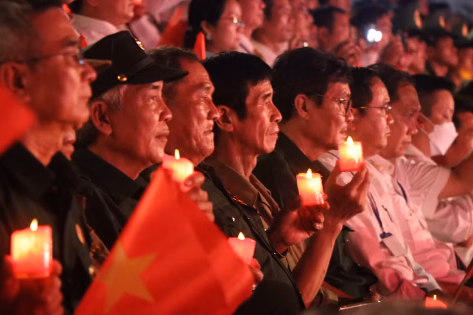 Các đại biểu dự Cầu truyền hình trực tiếp "Khúc tráng ca hòa bình" tại điểm cầu tỉnh Bình Định. (Ảnh: Kha Phạm/TTXVN)