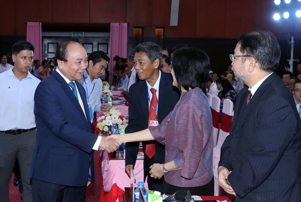 Thủ tướng Nguyễn Xuân Phúc với các đại biểu tham dự hội nghị. (Ảnh: Thống Nhất/TTXVN)