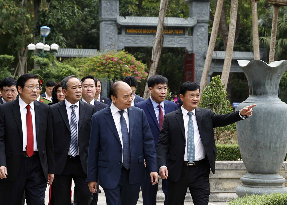 Chủ tịch nước Nguyễn Xuân Phúc thăm Khu di tích quốc gia đặc biệt Kim Liên, Nghệ An. (Ảnh: Thống Nhất/TTXVN)