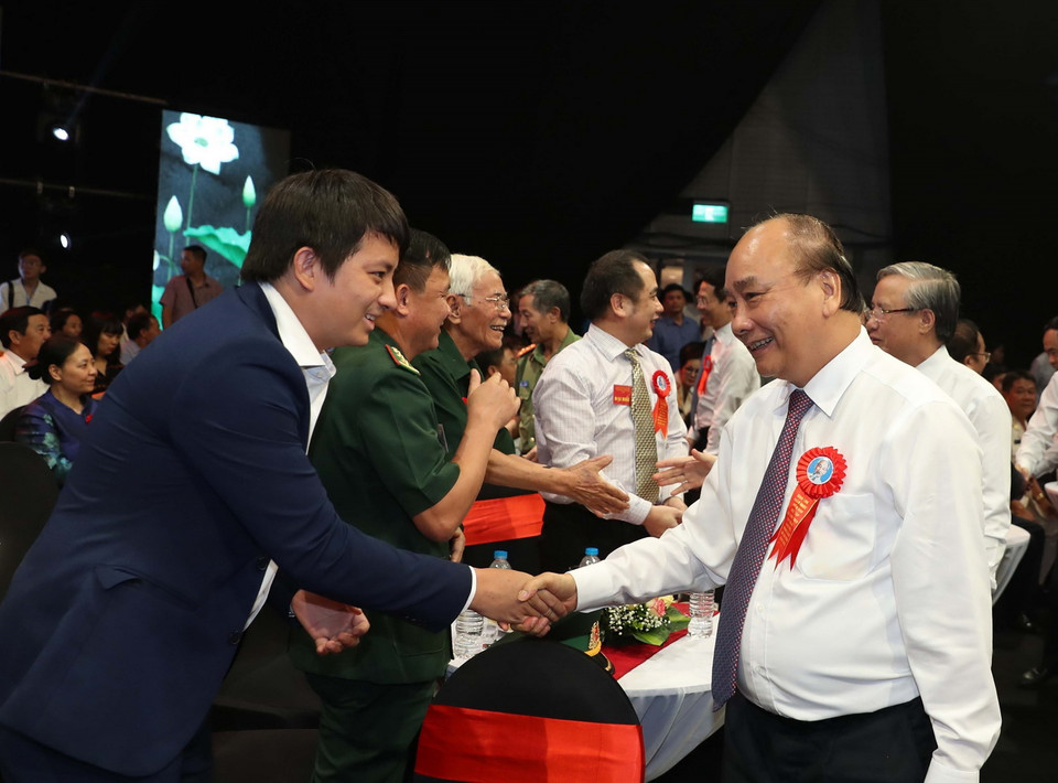 Thủ tướng Nguyễn Xuân Phúc và các lãnh đạo Đảng, Nhà nước tham dự Chương trình. (Ảnh: Thống Nhất/TTXVN)