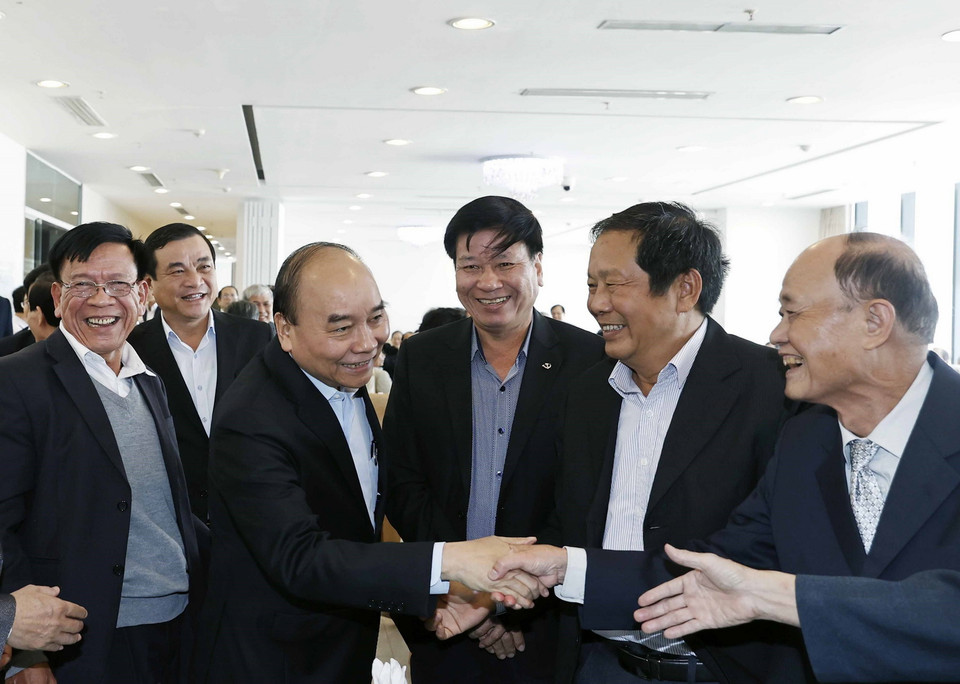 Chủ tịch nước Nguyễn Xuân Phúc và các đại biểu. (Ảnh: Thống Nhất/TTXVN)