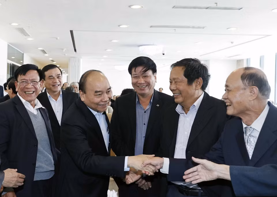 Chủ tịch nước Nguyễn Xuân Phúc và các đại biểu. (Ảnh: Thống Nhất/TTXVN)