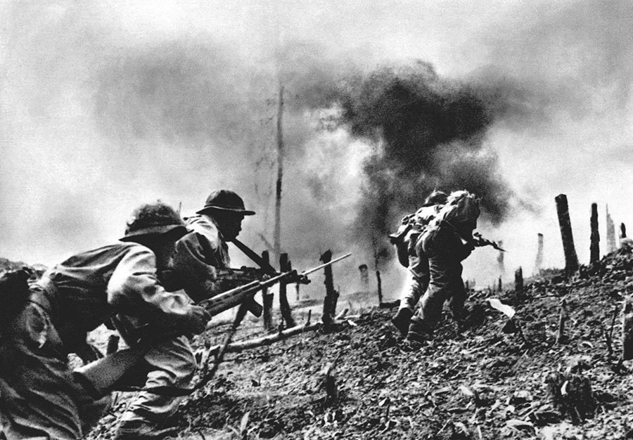 Công tác tuyên giáo đã thành công trong việc bồi dưỡng ý chí quyết tâm đánh Mỹ và thắng Mỹ. Trong ảnh: Quân giải phóng tiến công căn cứ lính thủy đánh bộ Mỹ ở Khe Sanh (Quảng Trị). (Ảnh: TTXVN)