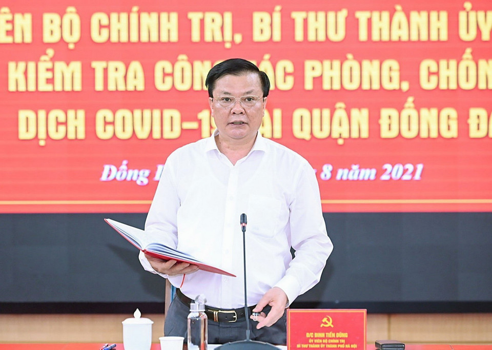  Bí thư Thành ủy Hà Nội Đinh Tiến Dũng phát biểu tại buổi làm việc với Quận ủy Đống Đa. (Ảnh: TTXVN)