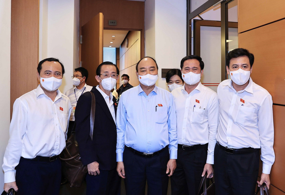 Chủ tịch nước Nguyễn Xuân Phúc với các đại biểu. (Ảnh: Thống Nhất/TTXVN)