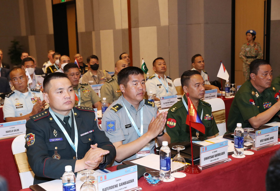 Tùy viên quân sự các nước tham dự hội thảo. (Ảnh: Trọng Đức/TTXVN)