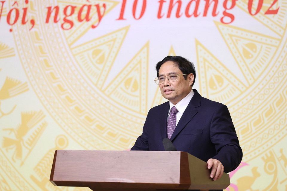  Thủ tướng Phạm Minh Chính động viên, chúc mừng Ban huấn luyện và Đội tuyển Bóng đá Nữ Việt Nam. (Ảnh: Dương Giang/TTXVN)