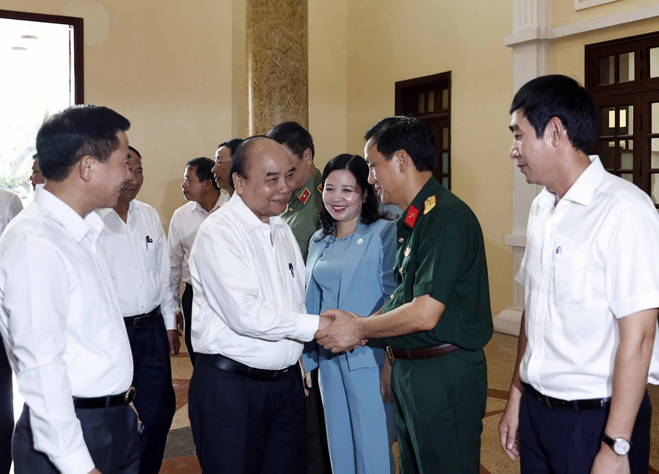 Chủ tịch nước và các đại biểu dự buổi làm việc. (Ảnh: Thống Nhất/TTXVN)