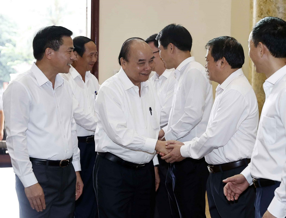 Sáng 29/8, Chủ tịch nước Nguyễn Xuân Phúc và các đại biểu dự buổi làm việc Ban Thường vụ Tỉnh ủy Thanh Hóa. (Ảnh: Thống Nhất/TTXVN)