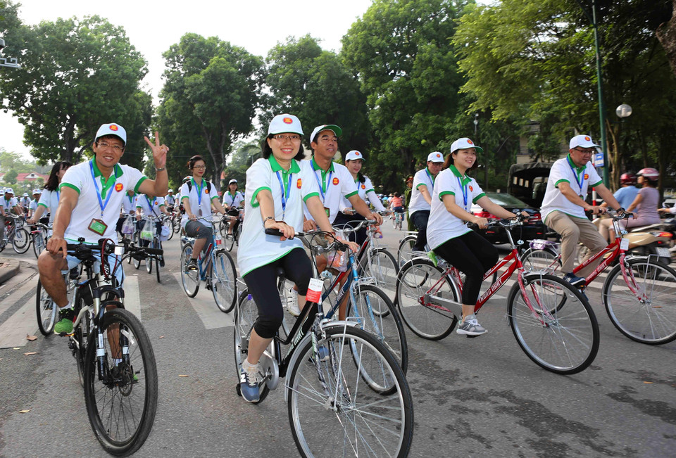 Đại biểu đạp xe hưởng ứng tại Chương trình "Ngày Gia đình ASEAN 2018," tổ chức ngày 25/8/2018 ở Hà Nội, nhân dịp kỷ niệm 51 năm thành lập ASEAN và 3 năm thành lập Cộng đồng ASEAN. (Ảnh: Dương Giang/TTXVN)