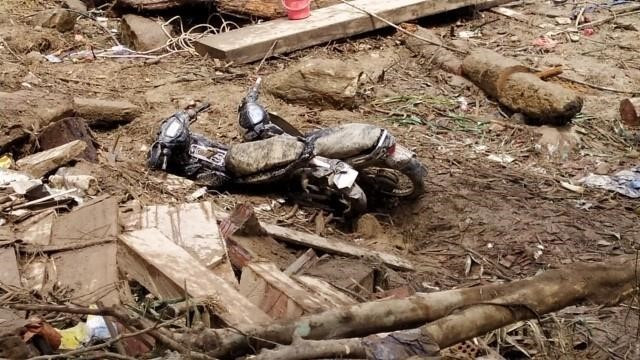 Sạt lở và lũ quét đã cuốn trôi hết mọi tài sản của người dân Trà Leng. (Ảnh: Trần Lê Lâm/TTXVN)