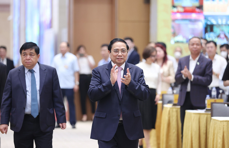 Thủ tướng Phạm Minh Chính đến dự Hội nghị công bố và triển khai Quy hoạch tổng thể quốc gia thời kỳ 2021-2030. (Ảnh: Dương Giang/TTXVN)
