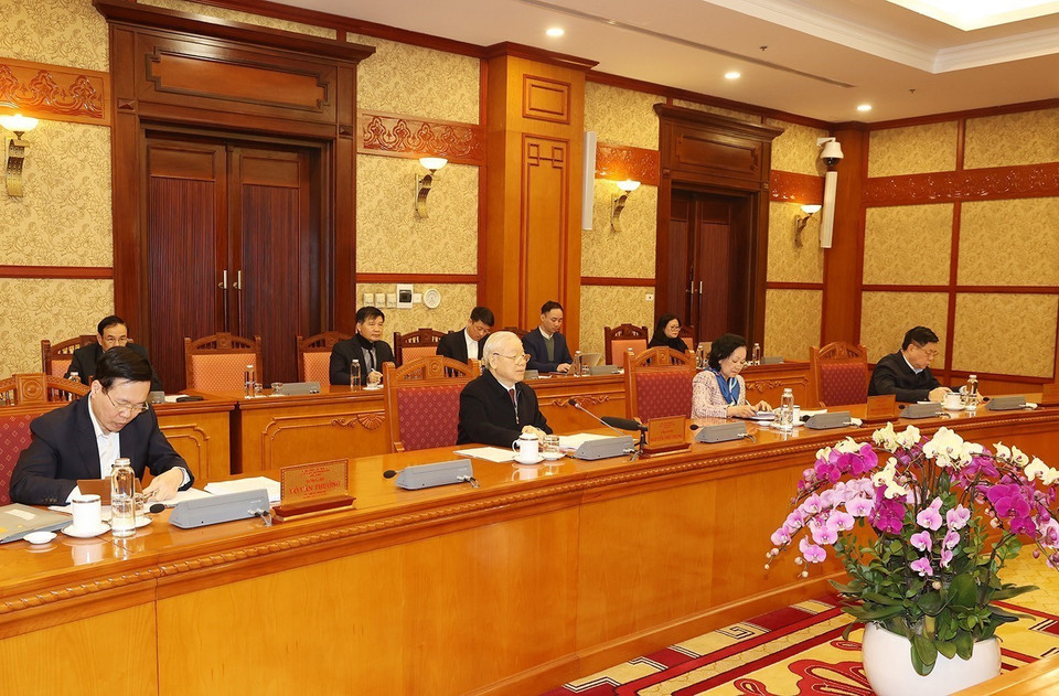 Tổng Bí thư Nguyễn Phú Trọng nghe các thành viên Ban Bí thư báo cáo. (Ảnh : Trí Dũng/TTXVN)