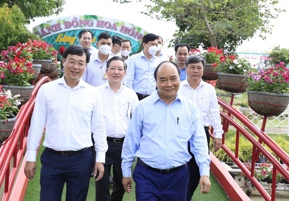 Sáng 29/3,Chủ tịch nước Nguyễn Xuân Phúc thăm Hội quán “Cùng nhau làm du lịch.” (Ảnh: Thống Nhất/TTXVN)