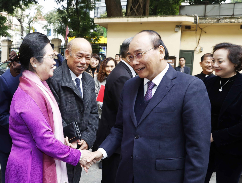 Chủ tịch nước Nguyễn Xuân Phúc và các đại biểu tại Ủy ban Đoàn kết Công giáo Việt Nam. (Ảnh: Thống Nhất/TTXVN)