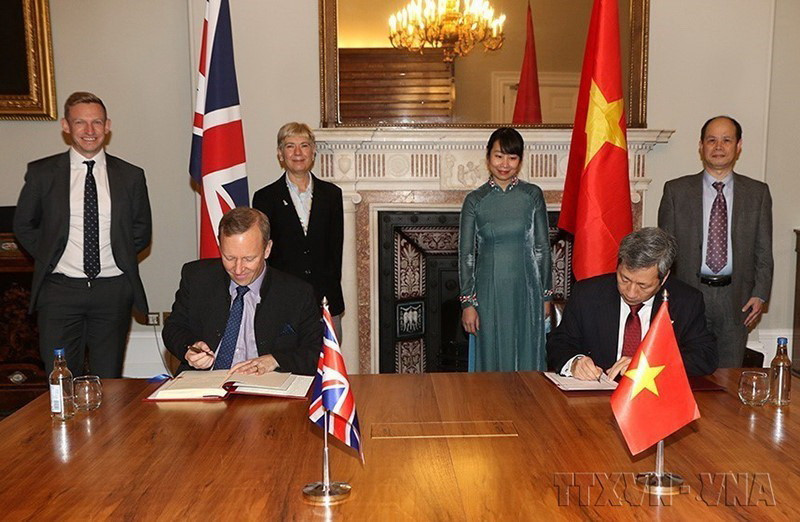  Ký Hiệp định Thương mại Tự do Việt Nam-Vương quốc Anh (UKVFTA), ngày 29/12/2020, tại London. (Ảnh: TTXVN phát)