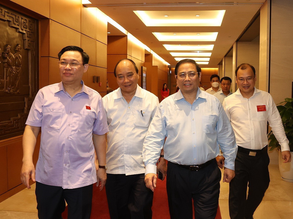 Chủ tịch nước Nguyễn Xuân Phúc, Thủ tướng Phạm Minh Chính, Chủ tịch Quốc hội Vương Đình Huệ đến dự hội nghị. (Ảnh: Trí Dũng/TTXVN)