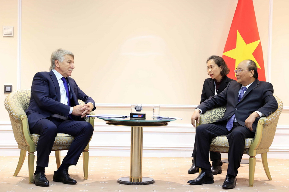 Quang cảnh buổi tiếp của Chủ tịch nước Nguyễn Xuân Phúc với Chủ tịch Tập đoàn Novatek Leonid Mikhelson. (Ảnh: Thống Nhất/TTXVN)