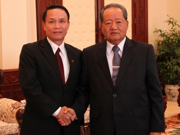 Lãnh đạo Lào tiếp đoàn đại biểu cấp cao TTXVN ảnh 1