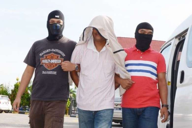 Tòa án Malaysia xét xử kẻ tuyển quân cho phiến quân IS ảnh 1